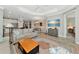 Open-concept living space with seamless flow to kitchen and dining areas, perfect for entertaining at 6907 Costa Bella Dr, Bradenton, FL 34209