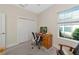 Office space featuring a desk, closet and natural light from a bright window at 6907 Costa Bella Dr, Bradenton, FL 34209