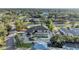 An aerial view of the property showcasing its private pool, lush landscaping, and desirable neighborhood location at 7912 Desoto Memorial Hwy, Bradenton, FL 34209