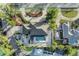 Overhead view of a home with a sparkling pool, well-maintained yard, and peaceful neighborhood setting at 7912 Desoto Memorial Hwy, Bradenton, FL 34209