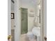 Charming bathroom featuring a walk-in shower and decorative wall mirror at 7912 Desoto Memorial Hwy, Bradenton, FL 34209