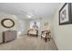 Neutral bedroom featuring carpet, a ceiling fan, and eclectic furniture at 7912 Desoto Memorial Hwy, Bradenton, FL 34209