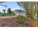 A charming two-story home with a well-maintained yard, mature landscaping, and an attached three car garage at 7912 Desoto Memorial Hwy, Bradenton, FL 34209