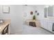 Bright bathroom featuring a soaking tub and vanity with ample counter space at 8579 Woodbriar Dr, Sarasota, FL 34238