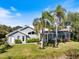 Lovely single-story home boasts screened lanai, lush landscaping and a tranquil setting at 8579 Woodbriar Dr, Sarasota, FL 34238