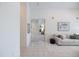 Open-concept design featuring a welcoming foyer transitioning into a cozy living space at 8579 Woodbriar Dr, Sarasota, FL 34238