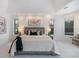 Large main bedroom with comfortable bed and neutral decor at 8579 Woodbriar Dr, Sarasota, FL 34238