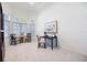 Bright office with natural light from large windows, perfect for a home office at 8579 Woodbriar Dr, Sarasota, FL 34238