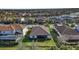 Aerial view of the home in a community with lake access and well-maintained landscaping at 13303 Swiftwater Way, Lakewood Ranch, FL 34211