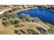 Aerial view of a gazebo-covered picnic area along the lake at 13303 Swiftwater Way, Lakewood Ranch, FL 34211