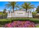 Community sign for Bridgewater at Lakewood Ranch with colorful flowers and manicured landscaping at 13303 Swiftwater Way, Lakewood Ranch, FL 34211