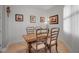 Dining area features a wooden table and chairs with lots of light at 13303 Swiftwater Way, Lakewood Ranch, FL 34211