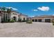 Elegant home featuring a circular paver driveway and a spacious three-car garage at 16416 Baycross Dr, Lakewood Ranch, FL 34202