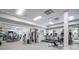 Well-equipped gym with modern exercise machines, natural light, and ample space for a comprehensive workout at 16416 Baycross Dr, Lakewood Ranch, FL 34202