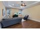 Living room showcasing hardwood floors, recessed lighting, and comfortable seating at 16416 Baycross Dr, Lakewood Ranch, FL 34202