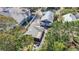 Aerial view showcasing the home's layout, outdoor spaces, and lush surroundings at 1687 Arlington St, Sarasota, FL 34239