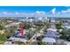 Aerial view of a neighborhood with mature trees, close proximity to a hospital, and other community buildings at 1687 Arlington St, Sarasota, FL 34239