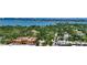 Breathtaking aerial view capturing the waterfront cityscape, lush foliage, and beautiful coastal views at 1735 Flower Dr, Sarasota, FL 34239