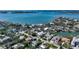 Stunning aerial view of a waterfront neighborhood, showcasing the property's proximity to the bay at 1735 Flower Dr, Sarasota, FL 34239