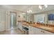 Bright bathroom featuring a glass shower, double vanity with lots of counter space, and modern lighting at 1735 Flower Dr, Sarasota, FL 34239