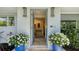 Open front door view of a foyer, with a glimpse of the home's interior design and decor at 1735 Flower Dr, Sarasota, FL 34239