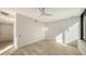 Bright and airy bedroom with wood flooring and ample closet space at 1932 Harbourside Dr # 244, Longboat Key, FL 34228