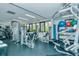 Spacious gym featuring modern exercise equipment, weight machines, and exercise balls for a complete workout experience at 1932 Harbourside Dr # 244, Longboat Key, FL 34228