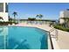 Tranquil pool with waterfront views and comfortable seating at 1932 Harbourside Dr # 244, Longboat Key, FL 34228