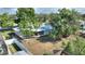 Aerial view of a fenced in back yard with a screened in porch at 22151 Lancaster Ave, Port Charlotte, FL 33952