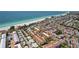 Stunning aerial view of beachfront condos with lush landscaping near the ocean at 224 17Th St # 224, Bradenton Beach, FL 34217