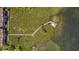 Top-down aerial view of the boardwalk, canopy, docks and the surrounding green areas, including water views at 224 17Th St # 224, Bradenton Beach, FL 34217