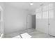 Clean bedroom with minimalist design, marble flooring, and natural light at 23117 Hammond Ave, Port Charlotte, FL 33954