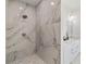 Modern bathroom featuring a large marble shower with dual shower heads and vanity at 23117 Hammond Ave, Port Charlotte, FL 33954