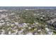 An aerial photograph showcases the property's beautiful setting near a winding river at 2345 Oak Ter, Sarasota, FL 34231