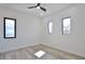 Bright bedroom with hardwood floors and modern windows at 2345 Oak Ter, Sarasota, FL 34231