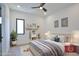 Stylishly decorated bedroom featuring bed, display shelving and area rug at 2345 Oak Ter, Sarasota, FL 34231