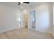 View of bedroom with hardwood floors, doorways, and view to ensuite bathroom at 2345 Oak Ter, Sarasota, FL 34231