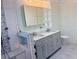 Bright bathroom with double vanity and walk-in shower at 2375 Riverwood Pines Dr, Sarasota, FL 34231