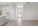 Bright and airy foyer with light tile floors leading to the main living areas of the home at 2388 Armenia Rd, North Port, FL 34286