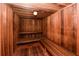 Traditional wooden sauna with built-in benches, offering a relaxing and therapeutic experience at 2755 Coconut Bay Ln 1K # 119, Sarasota, FL 34237