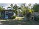 Backyard featuring partial view of the home, and many plants and greenery at 2784 Martin St, Sarasota, FL 34237