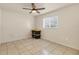 Simple, bright bedroom with tile flooring and a window allowing for natural light at 3311 19Th E St, Bradenton, FL 34208