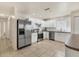 Spacious kitchen with stainless steel appliances and tile flooring at 3311 19Th E St, Bradenton, FL 34208