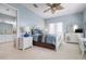 Bright bedroom with a coastal theme, includes ceiling fan, carpet, and white furnishings at 3404 79Th Street W Cir # 301, Bradenton, FL 34209