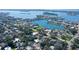 An aerial shot showcases the property's peaceful location, backing onto serene waters and lush surroundings at 3530 Flores Ave, Sarasota, FL 34239