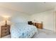 Bedroom with carpet flooring, full size bed with desk and dressers at 4061 Crockers Lake Blvd # 2611, Sarasota, FL 34238