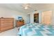 Bedroom boasts a ceiling fan, and a spacious walk-in closet at 4061 Crockers Lake Blvd # 2611, Sarasota, FL 34238