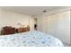 Bedroom boasts a cozy atmosphere with closet and desk at 4061 Crockers Lake Blvd # 2611, Sarasota, FL 34238