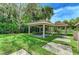 Community cabana features covered seating and picnic tables, providing a comfortable outdoor gathering space at 4061 Crockers Lake Blvd # 2611, Sarasota, FL 34238