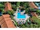 Aerial shot of the community pool featuring plenty of lounge chairs for residents at 4061 Crockers Lake Blvd # 2611, Sarasota, FL 34238